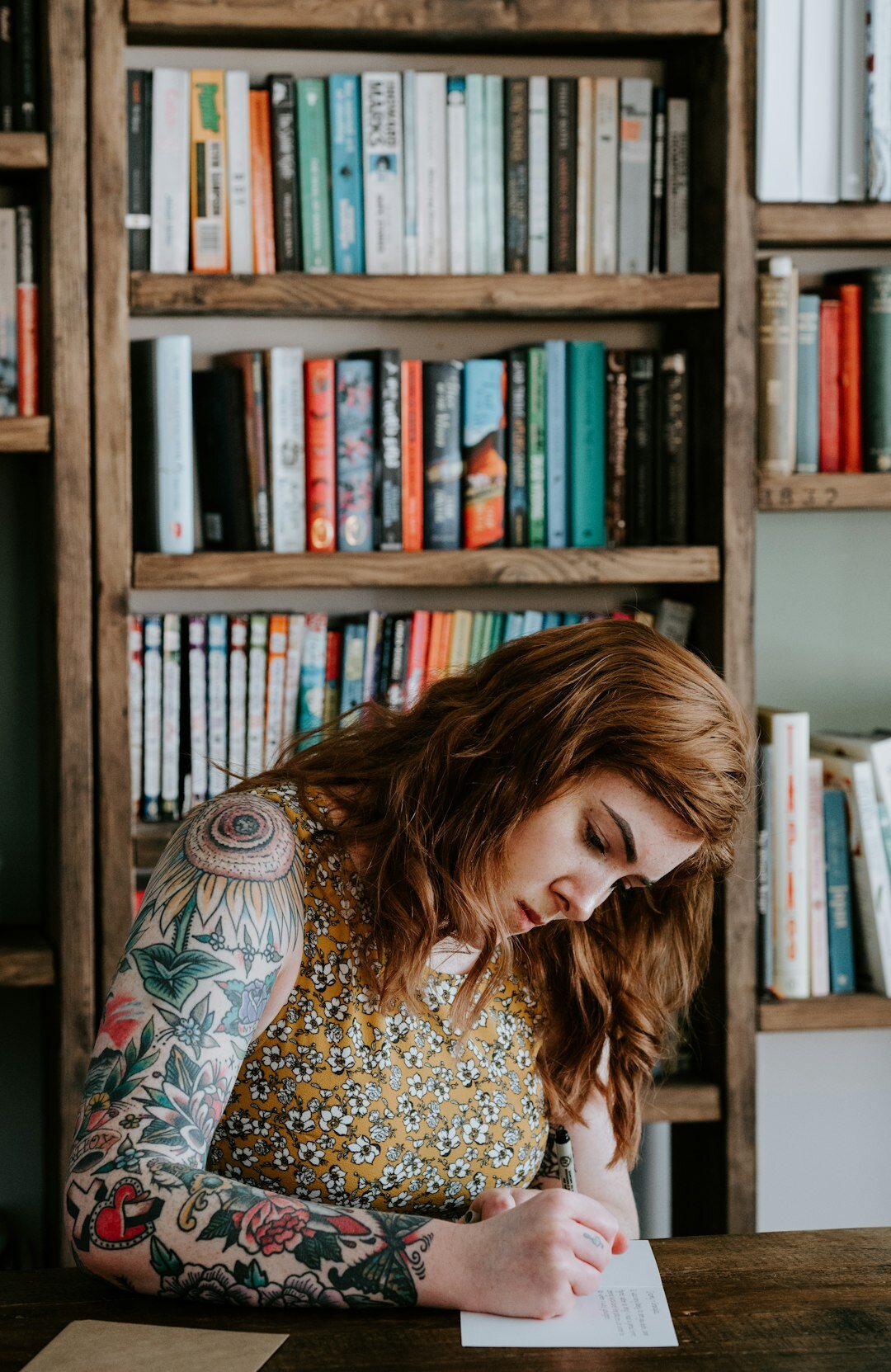 writer at desk plotting