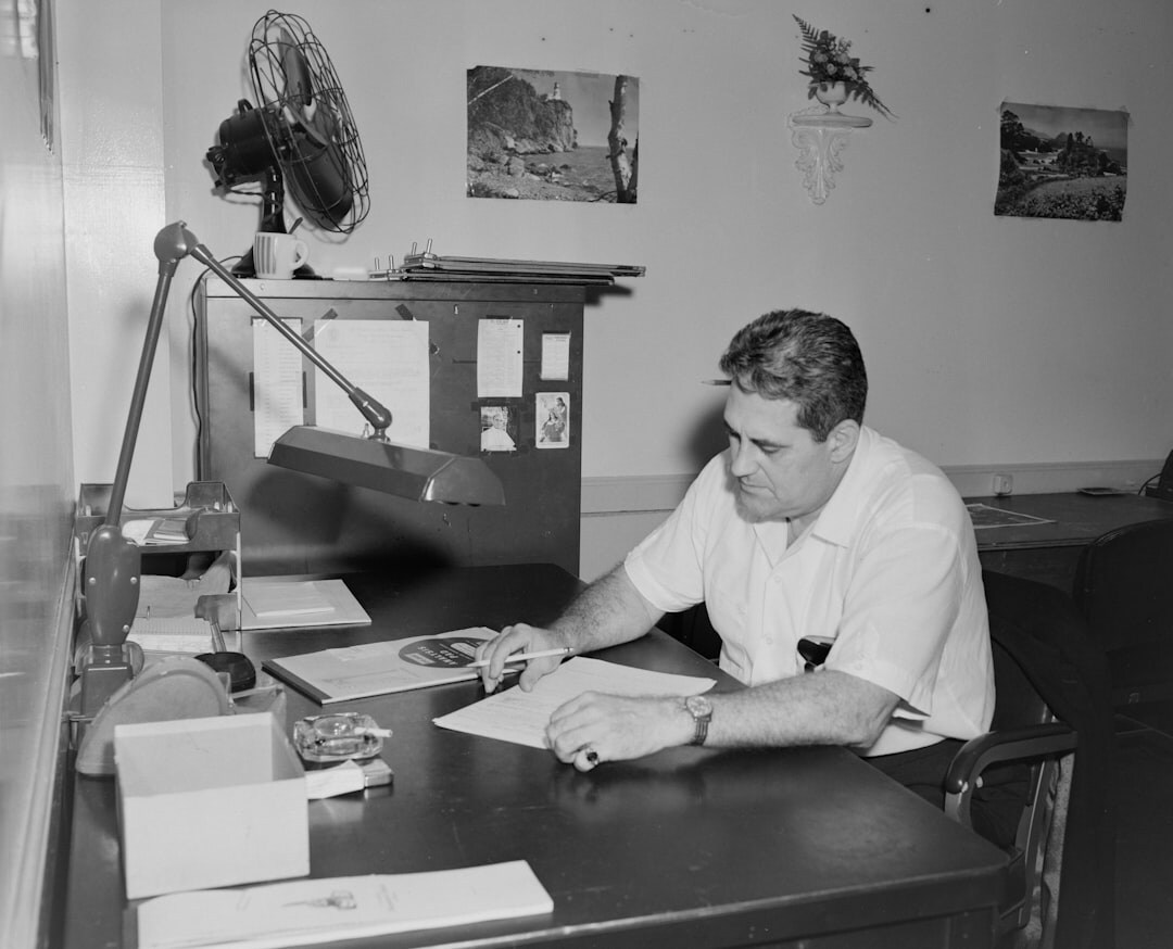 author writing at desk